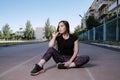 Portrait of attractive sport woman in sportswear posing outdoors at the stadium Royalty Free Stock Photo