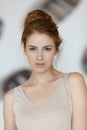 Portrait of beautiful redhead girl looking at camera. Royalty Free Stock Photo