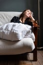 Portrait of an attractive thirty year old girl on her couch in the morning Royalty Free Stock Photo