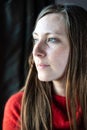 Portrait of an attractive thirty year old white woman wearing a casul red sweater Royalty Free Stock Photo