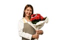 Portrait of attractive woman florist holding beautiful bouquet of red roses isolated on white background Royalty Free Stock Photo