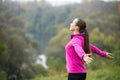 Portrait of an attractive woman outdoors in a sportswear