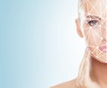 Portrait of attractive woman with a scnanning grid on her face. Face id, security, facial recognition, future technology