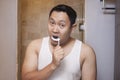 Man Brushing Teeth in Bathroom Royalty Free Stock Photo