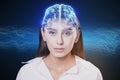 Portrait of attractive young businesswoman with creative digital brain hologram on blue background. Hi-tech innovation and AI