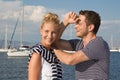 Portrait of attractive young couple in love on sailing boat. Royalty Free Stock Photo