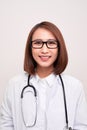 Portrait of an attractive young female asian doctor in white coat Royalty Free Stock Photo