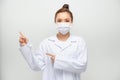 Portrait of an attractive young female doctor in white coat Royalty Free Stock Photo