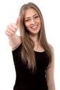 Portrait of attractive young female student showing a thumbs up