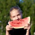 Portrait of attractive young girl with watermelon in outdoor Royalty Free Stock Photo