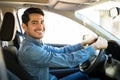 Attractive man driving a car Royalty Free Stock Photo