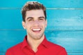 Portrait of an attractive young man smiling outdoors Royalty Free Stock Photo