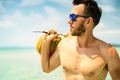 Portrait of an attractive young man on a tropical beach