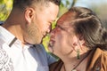 Portrait of an attractive young Maori couple staring into each others eyes