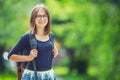 Portrait of attractive young teenage school girl with backpack