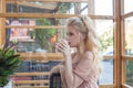 Portrait of attractive young woman drinking coffee Royalty Free Stock Photo