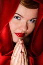 Portrait of attractive young woman in red hood Royalty Free Stock Photo