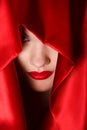 Portrait of attractive young woman in red hood Royalty Free Stock Photo