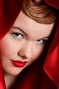 Portrait of attractive young woman in red hood Royalty Free Stock Photo