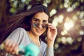 Hello sunshine. Portrait of an attractive young woman riding her bicycle outside. Royalty Free Stock Photo