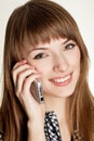 A portrait of attractive young women talking on cellular phone. Royalty Free Stock Photo