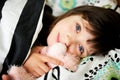 Portrait of awaken little girl in bed Royalty Free Stock Photo