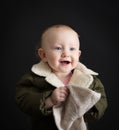 Portrait of the baby on black background