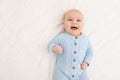 Portrait of a baby boy on the bed. Happy smiling baby Royalty Free Stock Photo