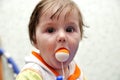 Portrait baby boy with toy ball in mouth Royalty Free Stock Photo