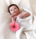 Portrait of a baby with flower