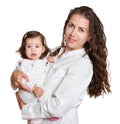 Portrait of baby girl and mother on white, happy family