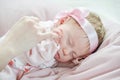 Sleeping baby holding parent hand close up Royalty Free Stock Photo