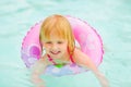 Portrait of baby girl with swimming in pool Royalty Free Stock Photo