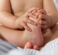 Portrait of baby hands and feet