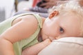 Portrait, baby and kid suck thumb in home, adorable or cute innocent child alone in house. Face of young blonde toddler Royalty Free Stock Photo