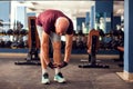 A portrait of senior man doing workout before training in the gym. People, healthcare and lifestyle concept Royalty Free Stock Photo