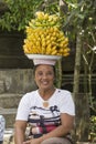 Portrait balinese woman together with bananas. Indonesia