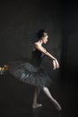 Portrait of the ballerina in ballet tatu on black Royalty Free Stock Photo