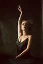 Portrait of the ballerina in ballet tatu on black Royalty Free Stock Photo