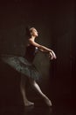 Portrait of the ballerina in ballet tatu on black Royalty Free Stock Photo