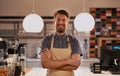 Portrait, barista man and startup in cafe with arms crossed. Coffee shop, waiter and confident entrepreneur, happy and Royalty Free Stock Photo