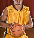 Portrait of Basketball Player shooting ball for 3 points Royalty Free Stock Photo