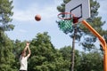 portrait basketball player taking jump shot