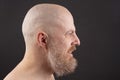 Portrait of a bearded and bald man in profile Royalty Free Stock Photo
