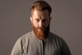 Portrait of bearded man. Irish man with red beard and moustache. Unshaven man with serious face Royalty Free Stock Photo