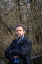 Portrait of a bearded middle-aged man in a black jacket Royalty Free Stock Photo