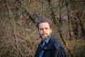 Portrait of a bearded middle-aged man in a black jacket Royalty Free Stock Photo