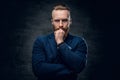 Redhead hipster male dressed in a blue jacket. Royalty Free Stock Photo