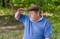 Portrait of bearded senior man looking into the distance