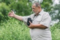 Portrait of a bearded senior photographer man